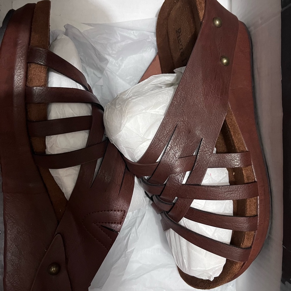 Size 8. New in box.
